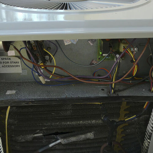 An Open AC Ready for Parts Replacement.